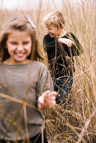 Kids Walking Happily in the Fields Captured by Steffen Sharikov - Commercial Photography Services Bloomington
