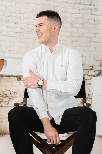 Man Posing in a White Shirt and Black Pant - Corporate Headshots by Headshot Photographer in Minneapolis
