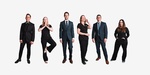 A Group of Team Posing With a Classy White Theme - Corporate Headshots by Headshot Photographer in Minneapolis