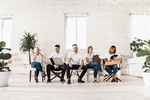 A Group of Team Posing for Branding With a Classy White Theme - Corporate Headshots by Headshot Photographer in Minneapolis